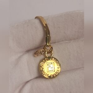 Fendi Gold Round Logo Charm on herringbone Bracelet